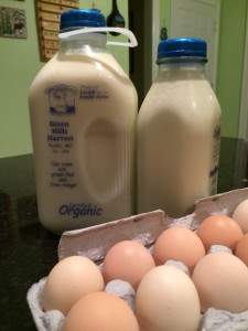 close up of raw milk, cream and eggs